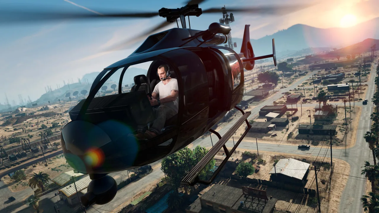 Trevor flies a helicopter over Blaine County in Grand Theft Auto V
