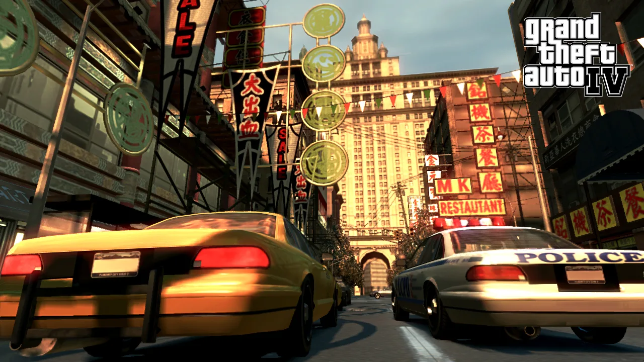 A taxi and police car racing through Chinatown in Liberty City
