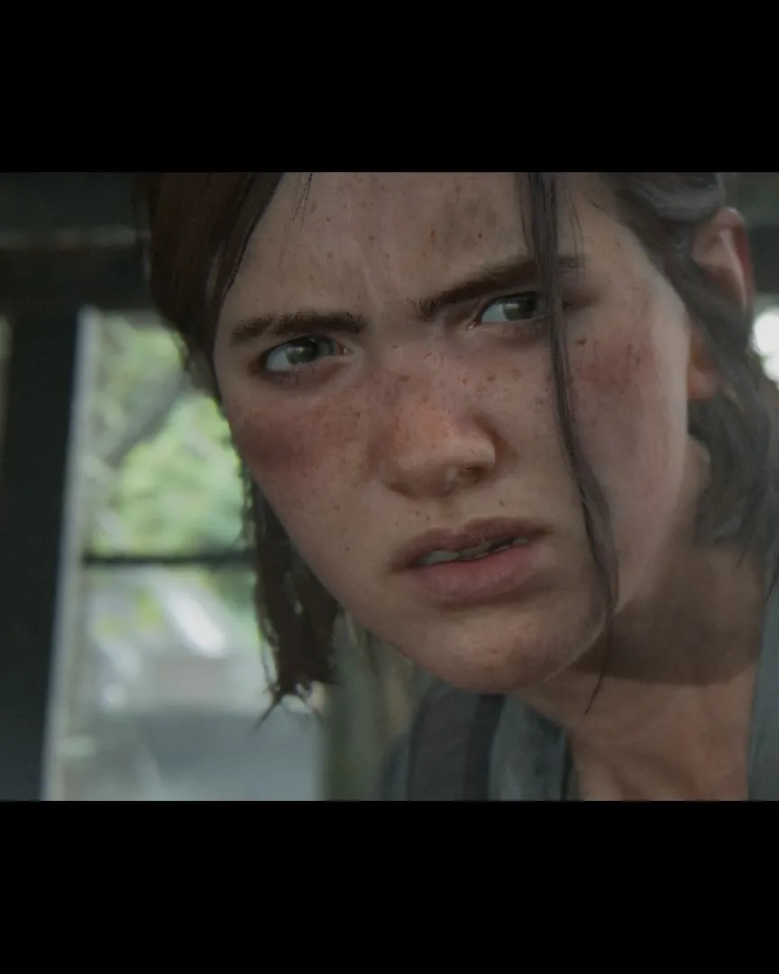 Close portrait of Ellie Williams holding a hatchet in an official The Last of Us Part II Photo Mode image