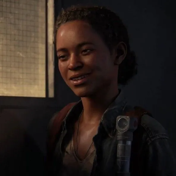 Riley Abel smiling in an in-game scene from The Last of Us: Left Behind